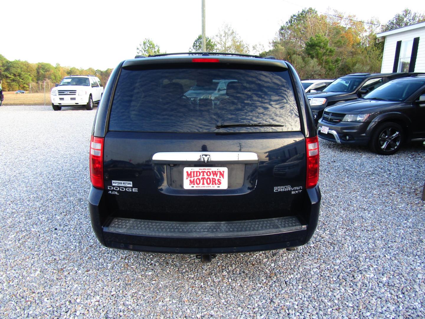 2010 Blue Dodge Grand Caravan SXT (2D4RN5DX9AR) with an 4.0L V6 SOHC 24V engine, Automatic transmission, located at 15016 S Hwy 231, Midland City, AL, 36350, (334) 983-3001, 31.306210, -85.495277 - Photo#7